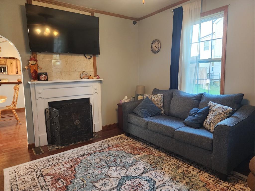 709 North 7th Street Apollo, PA 15613 - Photo 12 of 50 a living room with furniture and a fireplace