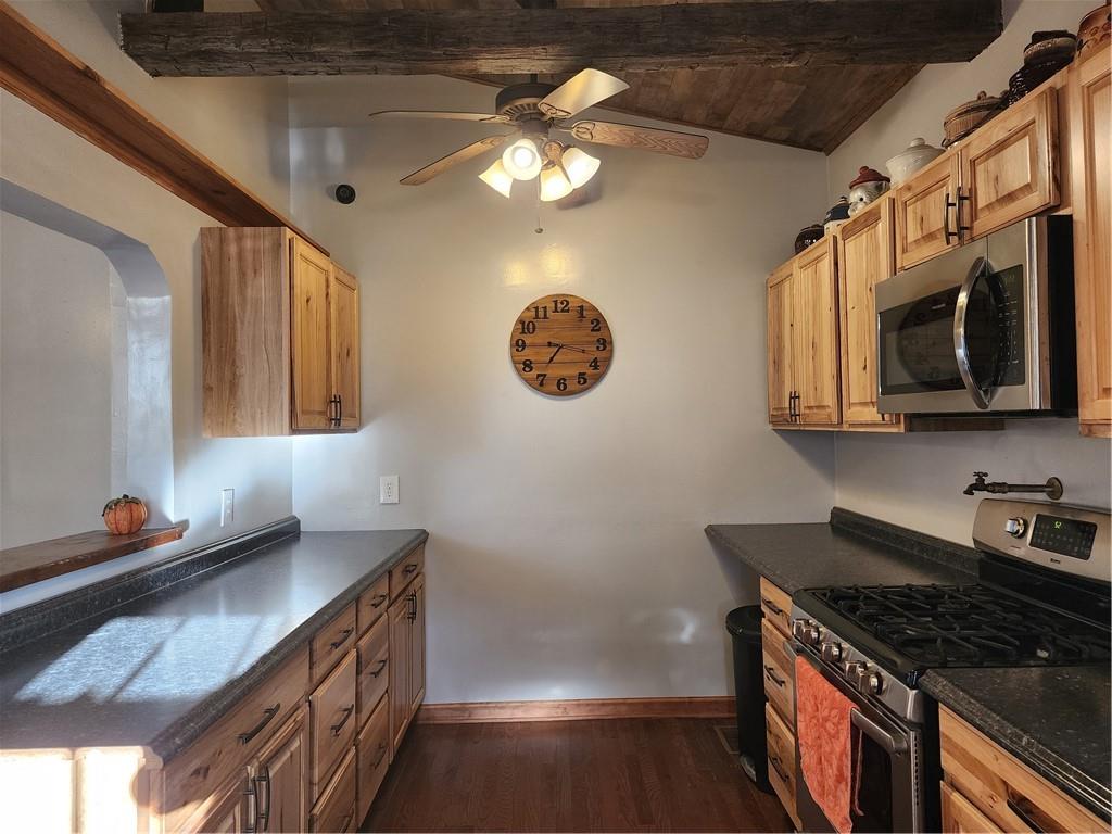 709 North 7th Street Apollo, PA 15613 - Photo 22 of 50 a kitchen with stainless steel appliances granite countertop a stove a sink and a microwave