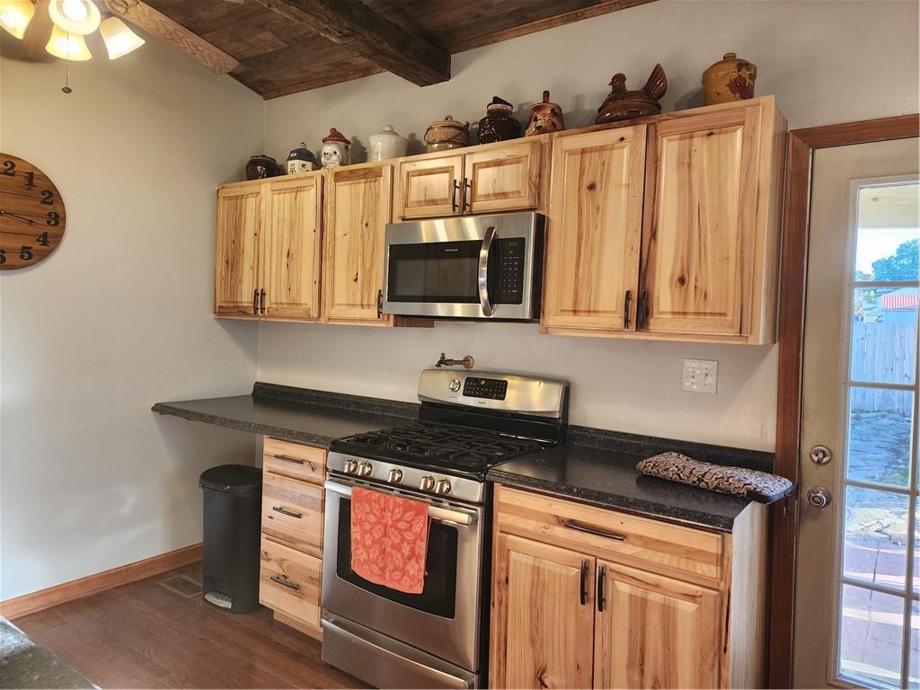 709 North 7th Street Apollo, PA 15613 - Photo 23 of 50 a kitchen with stainless steel appliances granite countertop a stove and a microwave