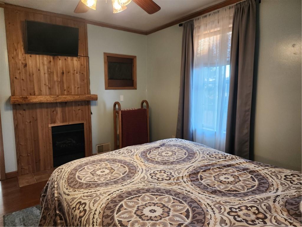 709 North 7th Street Apollo, PA 15613 - Photo 29 of 50 a bedroom with a bed and a flat screen tv