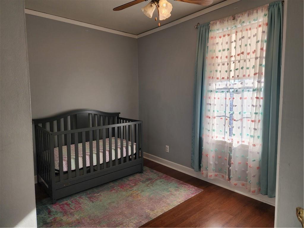 709 North 7th Street Apollo, PA 15613 - Photo 31 of 50 a view of empty room with wooden floor and fan