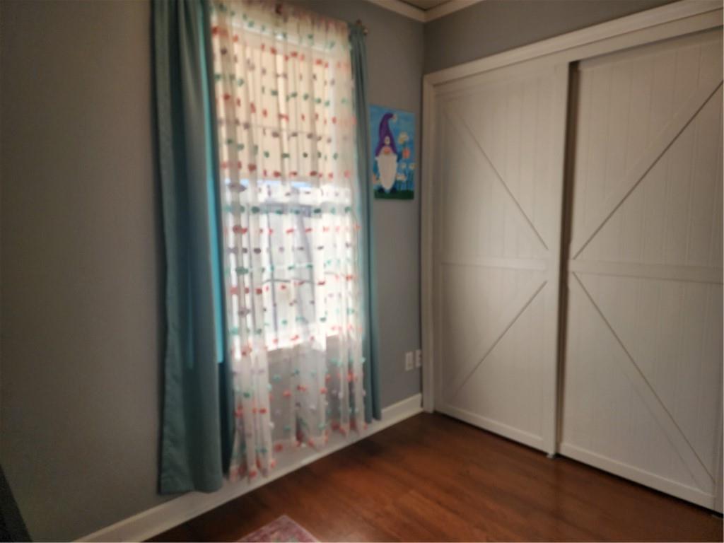 709 North 7th Street Apollo, PA 15613 - Photo 33 of 50 a view of an empty room with wooden floor and a window