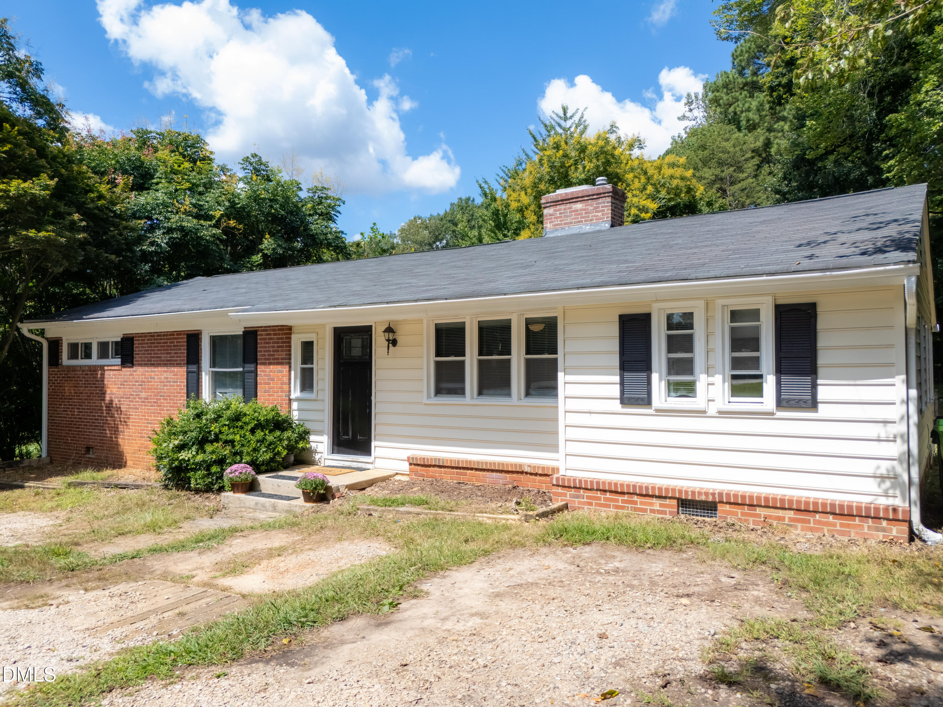 3418 Avent Ferry Road Raleigh, NC 27606 - Photo 1 of 25 a front view of a house with a yard