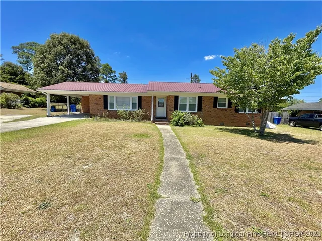 a house view with a outdoor space