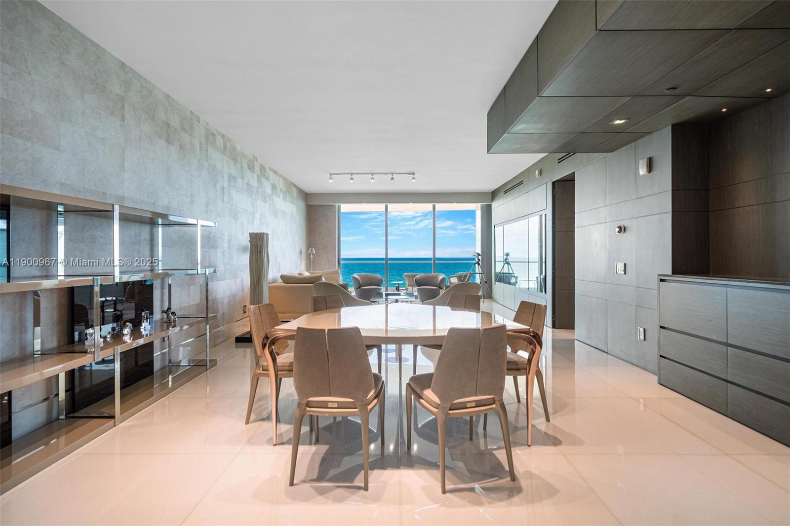 9349 Collins Avenue, Unit 503 Surfside, FL 33154 - Photo 4 of 30 a view of a dining room with furniture
