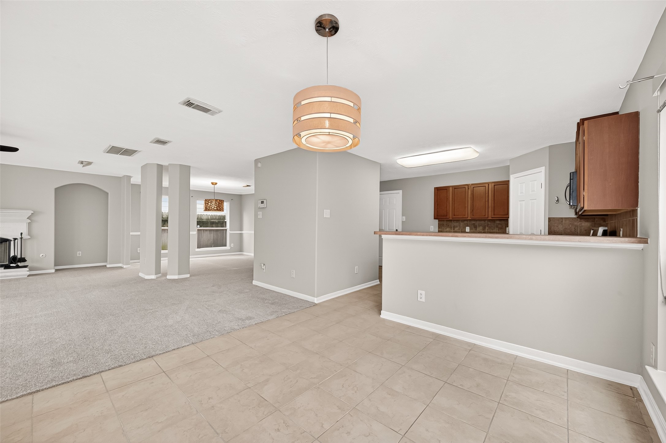 2415 Lacyberry Street Houston, TX 77080 - Photo 16 of 50 a view of a kitchen with a sink and a refrigerator