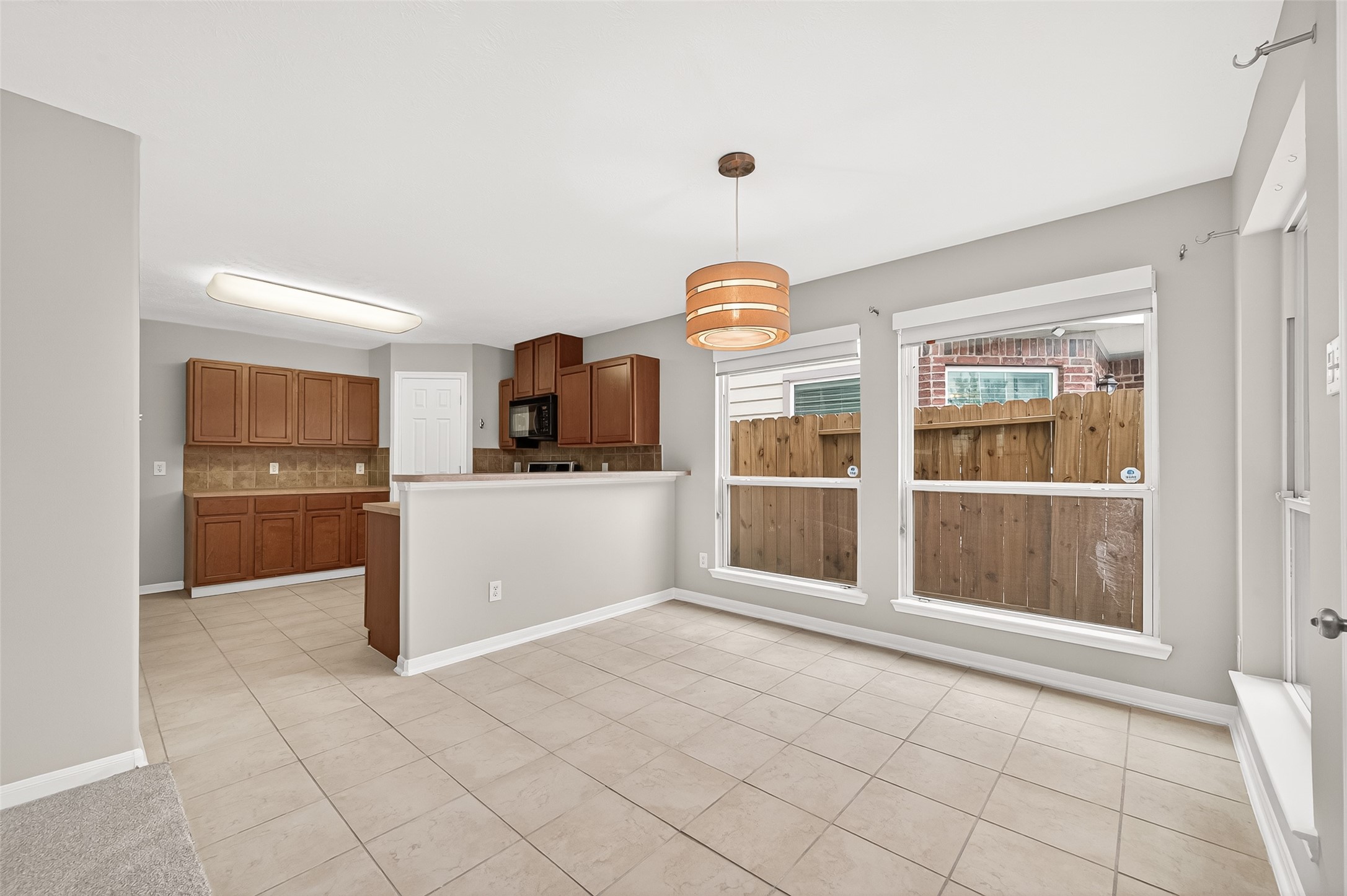 2415 Lacyberry Street Houston, TX 77080 - Photo 17 of 50 a view of kitchen with window and refrigerator