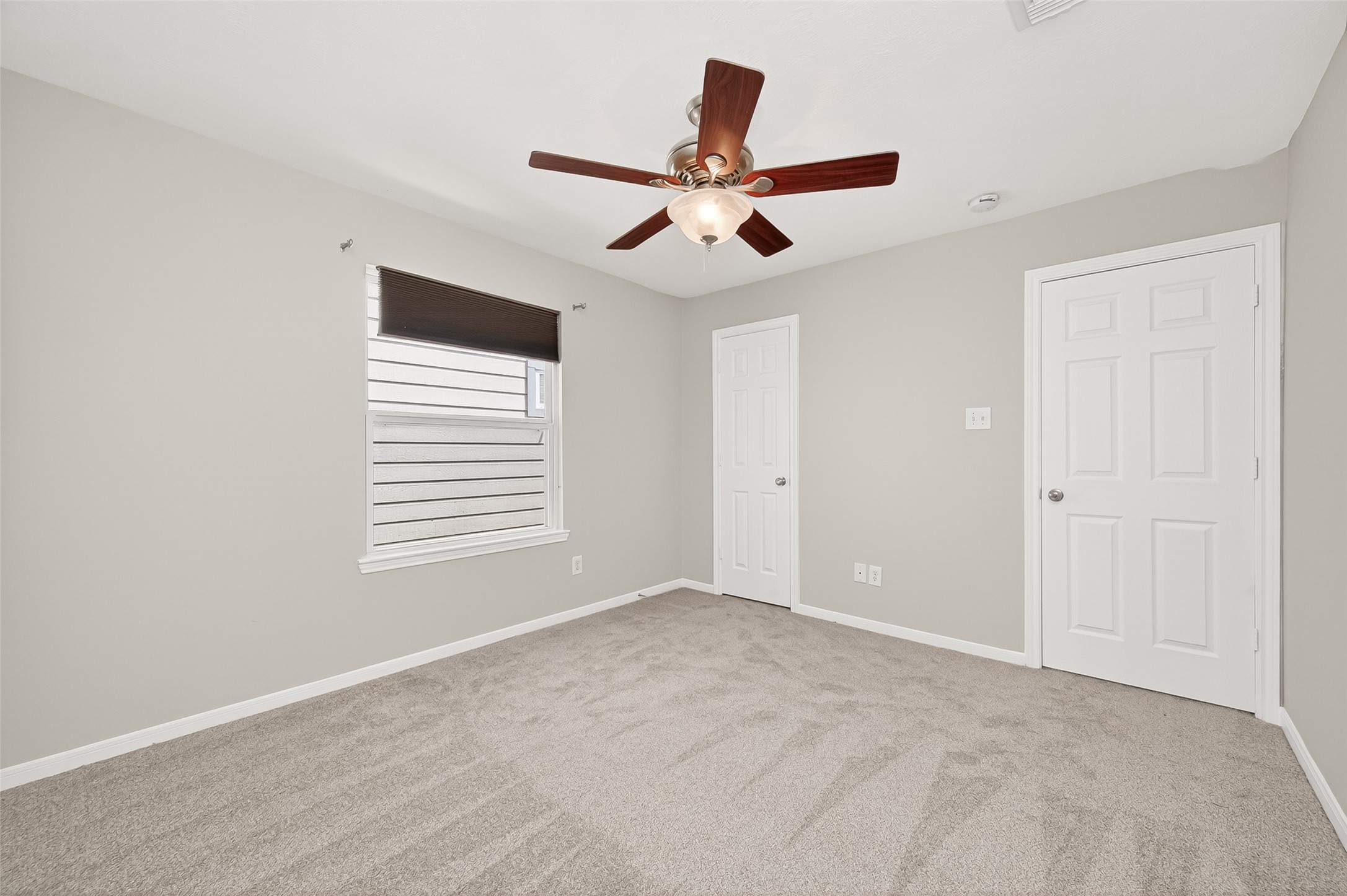 2415 Lacyberry Street Houston, TX 77080 - Photo 27 of 50 a view of an empty room with a window