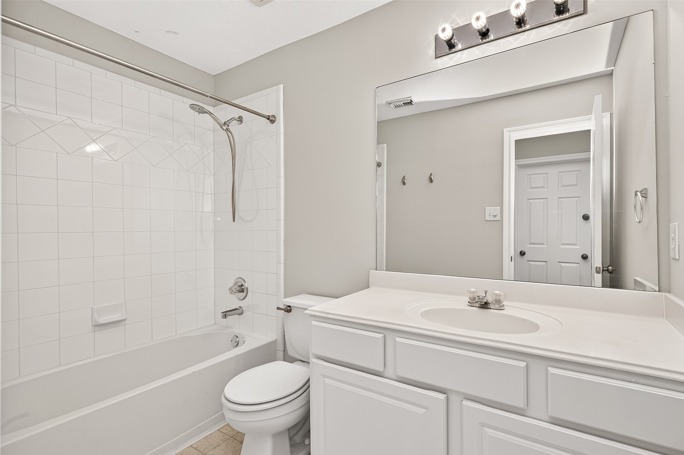 2415 Lacyberry Street Houston, TX 77080 - Photo 33 of 50 a bathroom with a sink a toilet and a bathtub