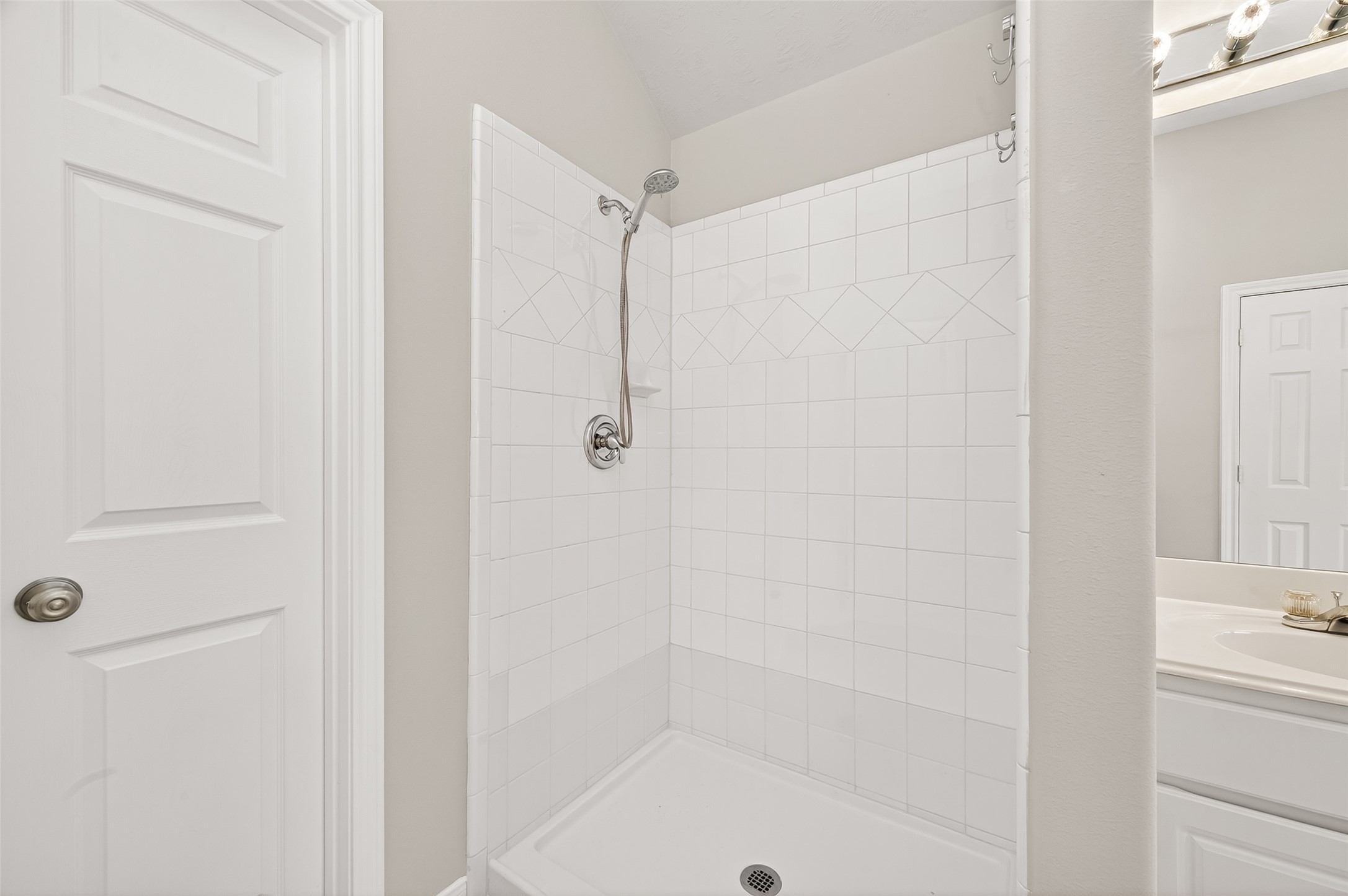 2415 Lacyberry Street Houston, TX 77080 - Photo 43 of 50 a bathroom with a shower and a bath tub