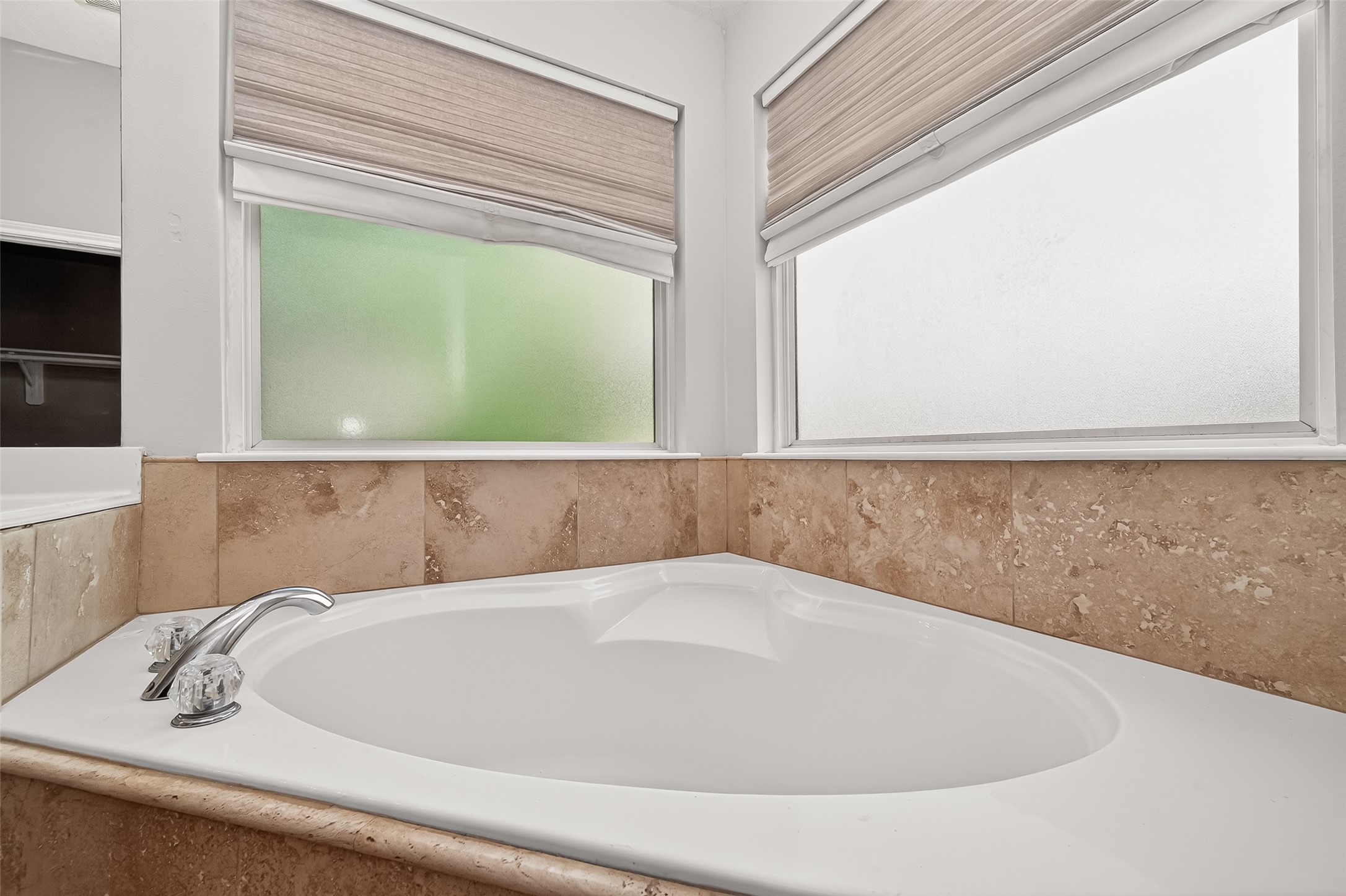 2415 Lacyberry Street Houston, TX 77080 - Photo 45 of 50 a bathroom with a bathtub and a window