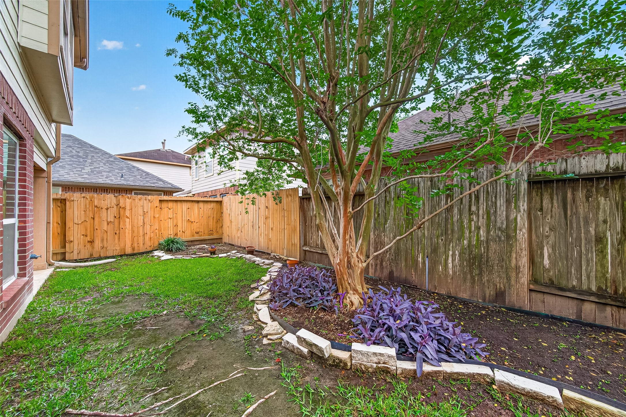 2415 Lacyberry Street Houston, TX 77080 - Photo 50 of 50 a front view of a house with garden