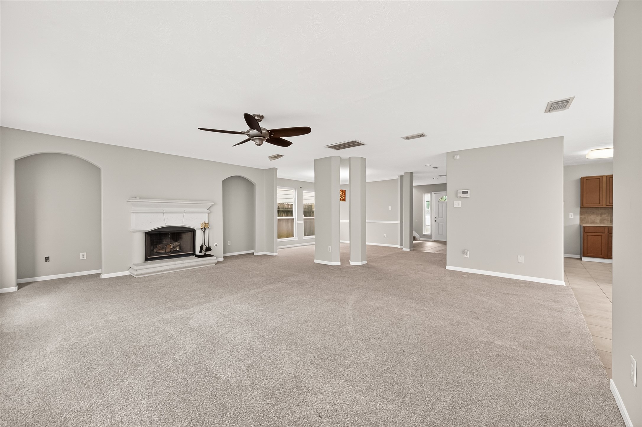 2415 Lacyberry Street Houston, TX 77080 - Photo 7 of 50 a view of empty room with a fireplace