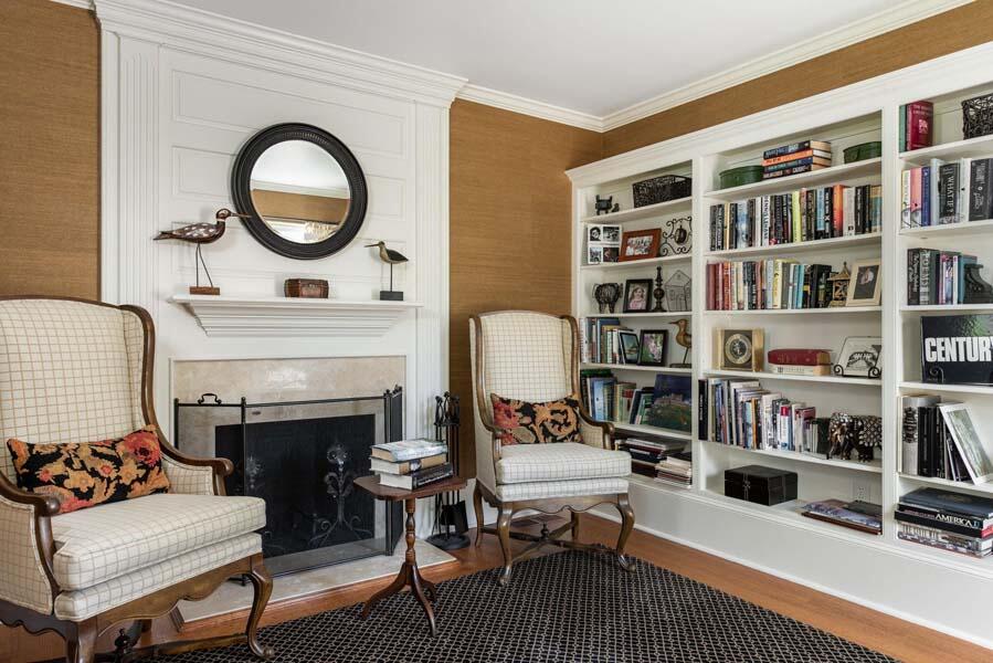 56 Rendezvous Lane Barnstable, MA 02630 - Photo 21 of 38 a living room with furniture and a bookshelf
