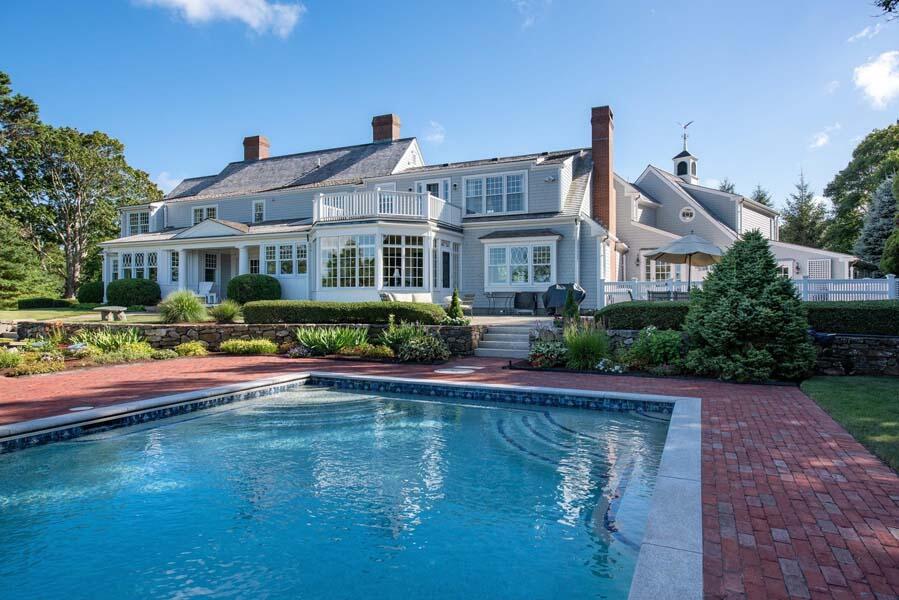 56 Rendezvous Lane Barnstable, MA 02630 - Photo 3 of 38 a front view of a house with swimming pool