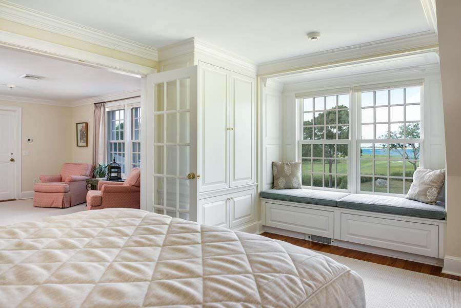 56 Rendezvous Lane Barnstable, MA 02630 - Photo 33 of 38 a bedroom with furniture and large windows