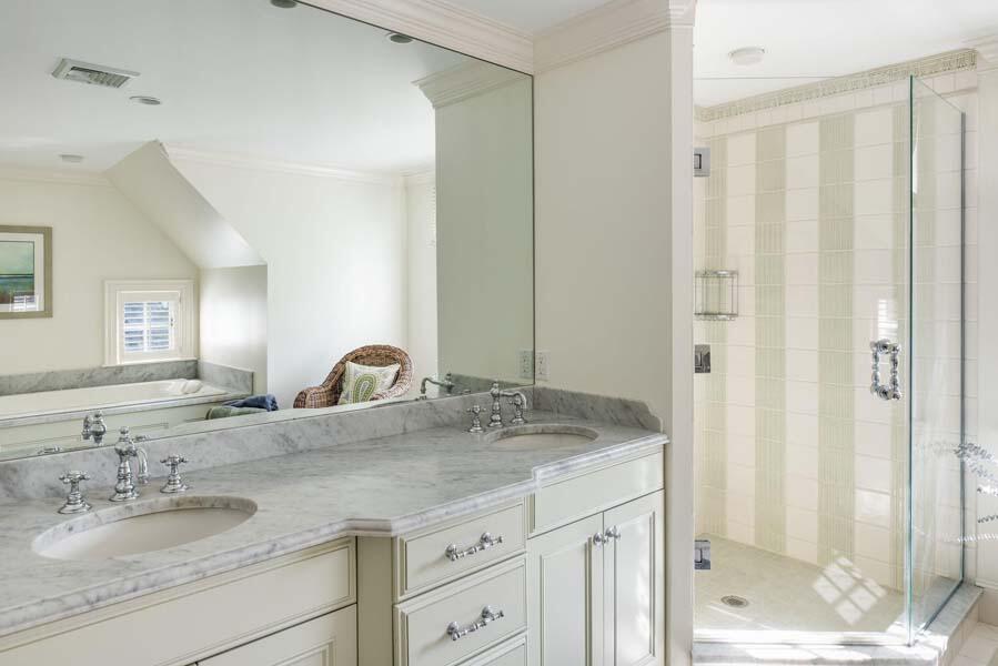 56 Rendezvous Lane Barnstable, MA 02630 - Photo 34 of 38 a bathroom with a granite countertop sink and a mirror