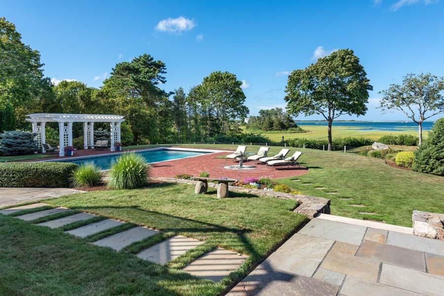 56 Rendezvous Lane Barnstable, MA 02630 - Photo 5 of 38 a view of a house with a backyard