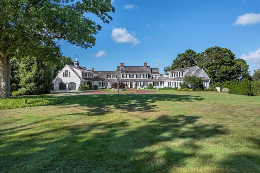 56 Rendezvous Lane Barnstable, MA 02630 - Photo 6 of 38 a house view with a garden in front of it