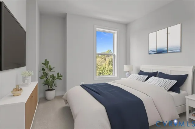 an empty room with closet and a bathroom