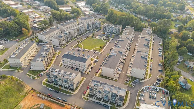 an aerial view of residential building and lake view