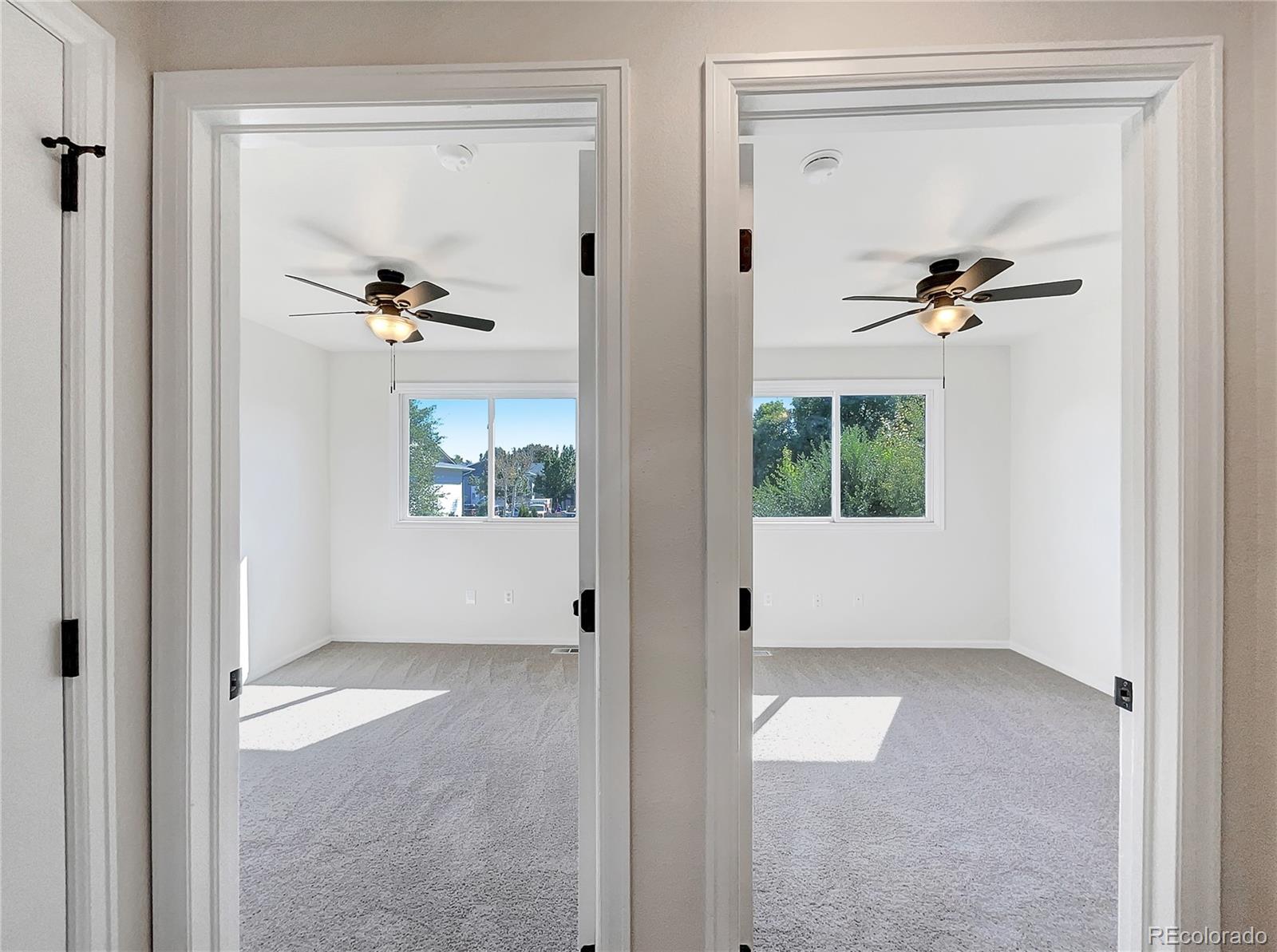 2134 3rd Street Southwest, Unit 2 Loveland, CO 80537 - Photo 18 of 31 a view of an entryway with wooden floor