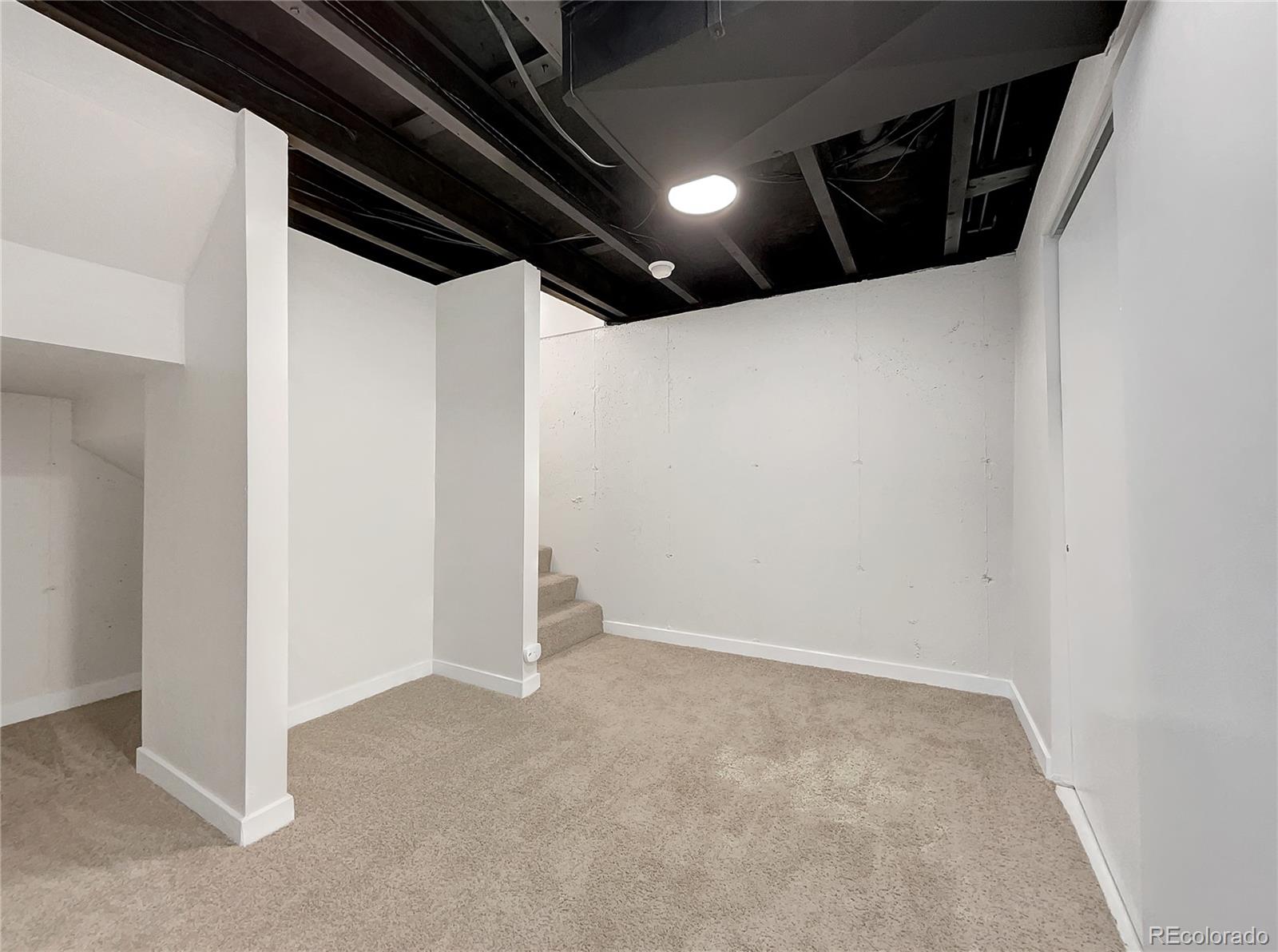 2134 3rd Street Southwest, Unit 2 Loveland, CO 80537 - Photo 21 of 31 a view of an empty room