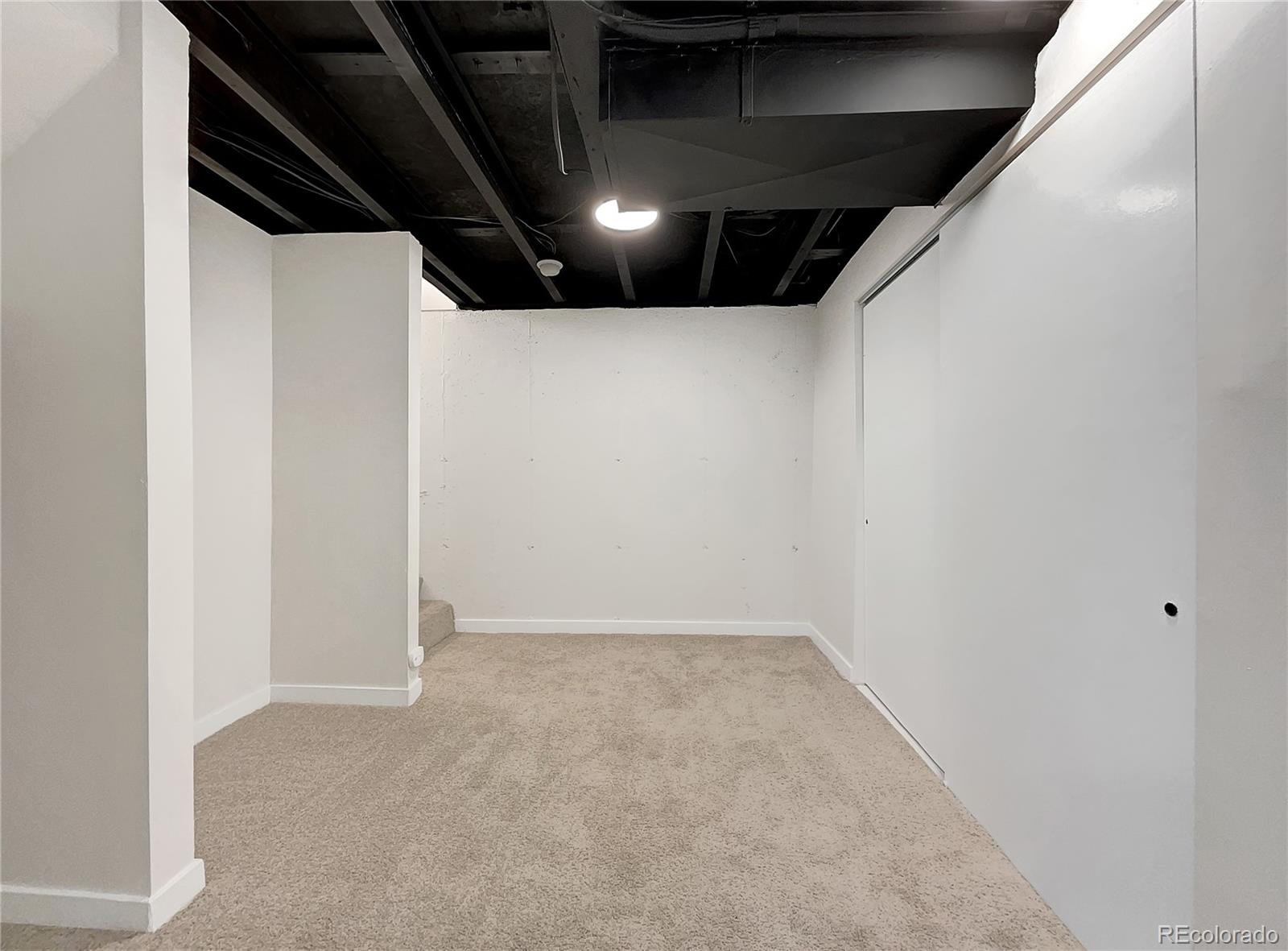 2134 3rd Street Southwest, Unit 2 Loveland, CO 80537 - Photo 22 of 31 a view of an empty room