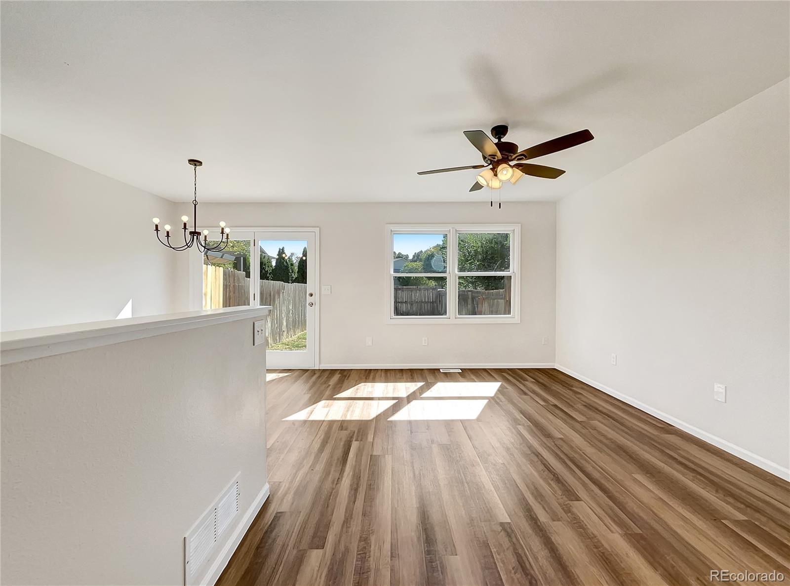 2134 3rd Street Southwest, Unit 2 Loveland, CO 80537 - Photo 10 of 31 a view of an empty room with a window