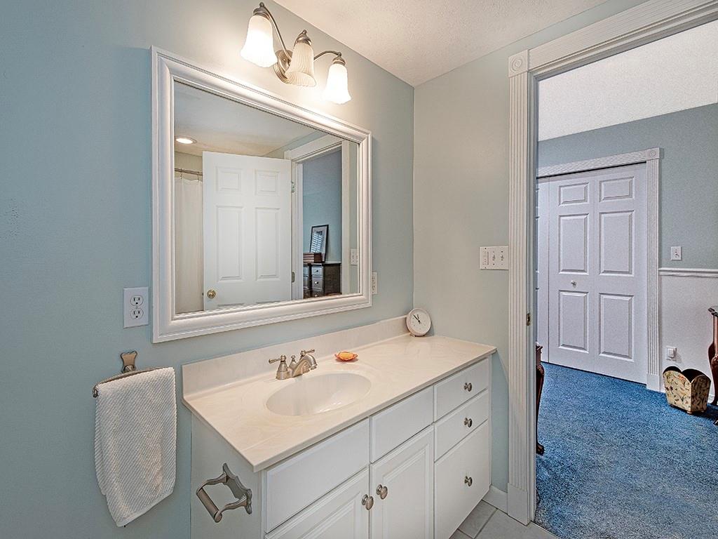 1001 Eddy Court Gibsonia, PA 15044 - Photo 19 of 29 a bathroom with a sink and a mirror