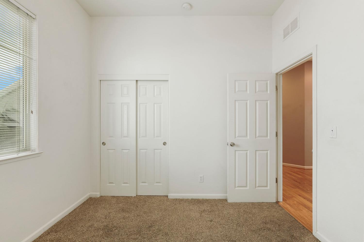 904 Sebastian Lane Manteca, CA 95336 - Photo 13 of 21 an empty room with windows
