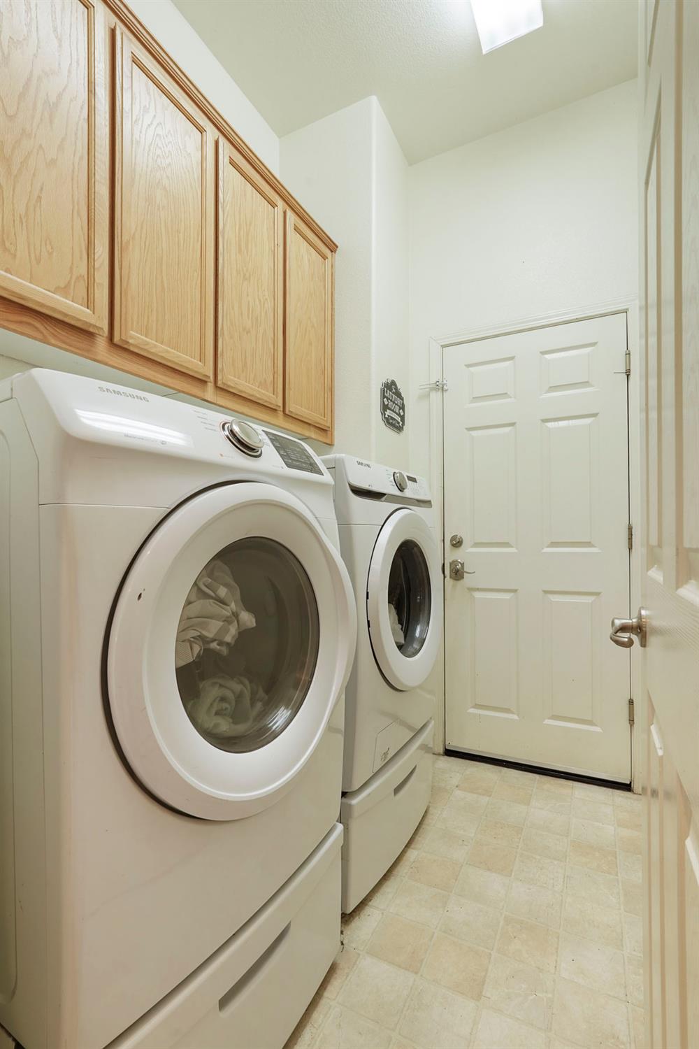904 Sebastian Lane Manteca, CA 95336 - Photo 16 of 21 a utility room with dryer and washer