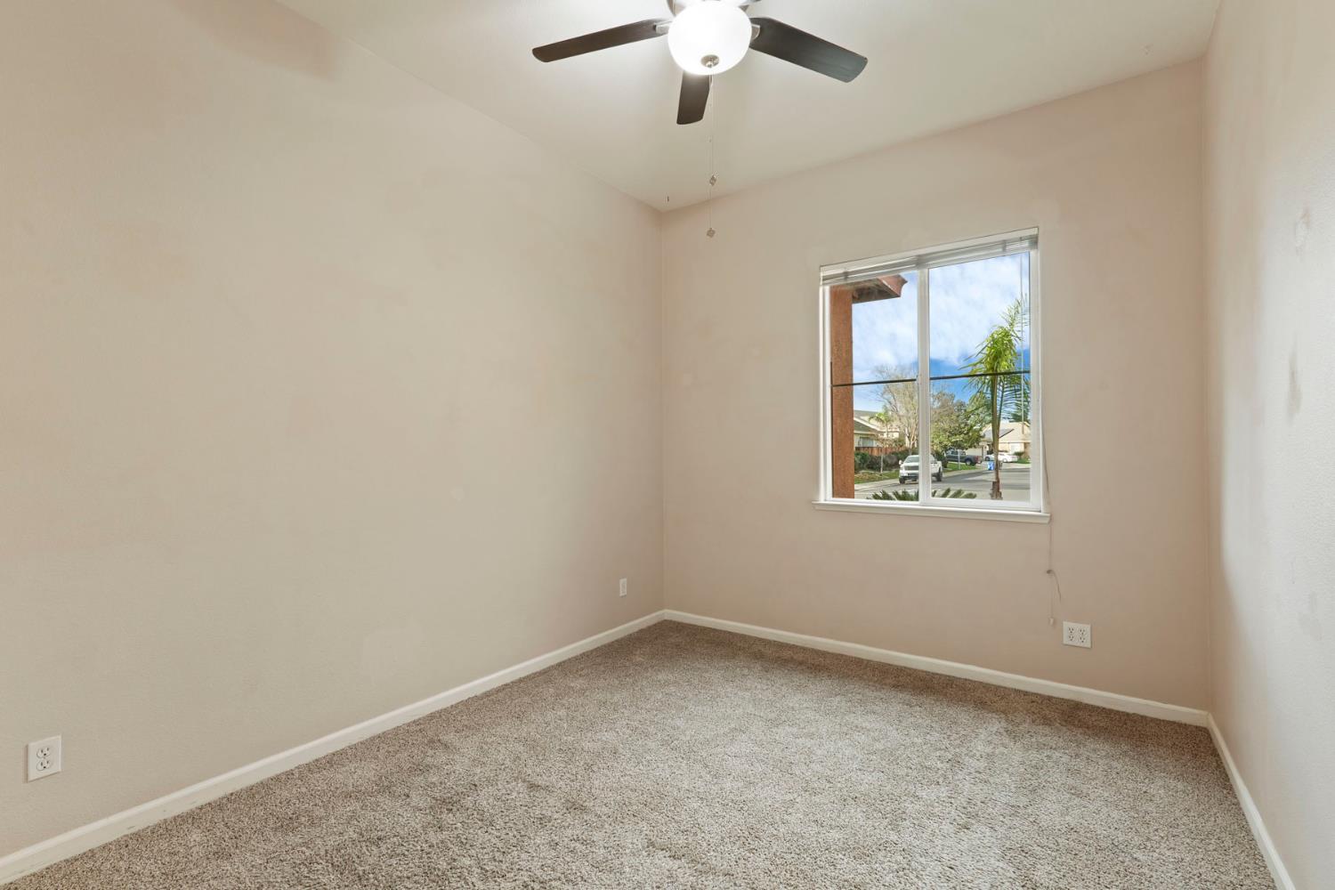 904 Sebastian Lane Manteca, CA 95336 - Photo 10 of 21 an empty room with a window
