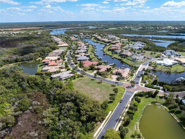 an aerial view of ocean with residential building and ocean view