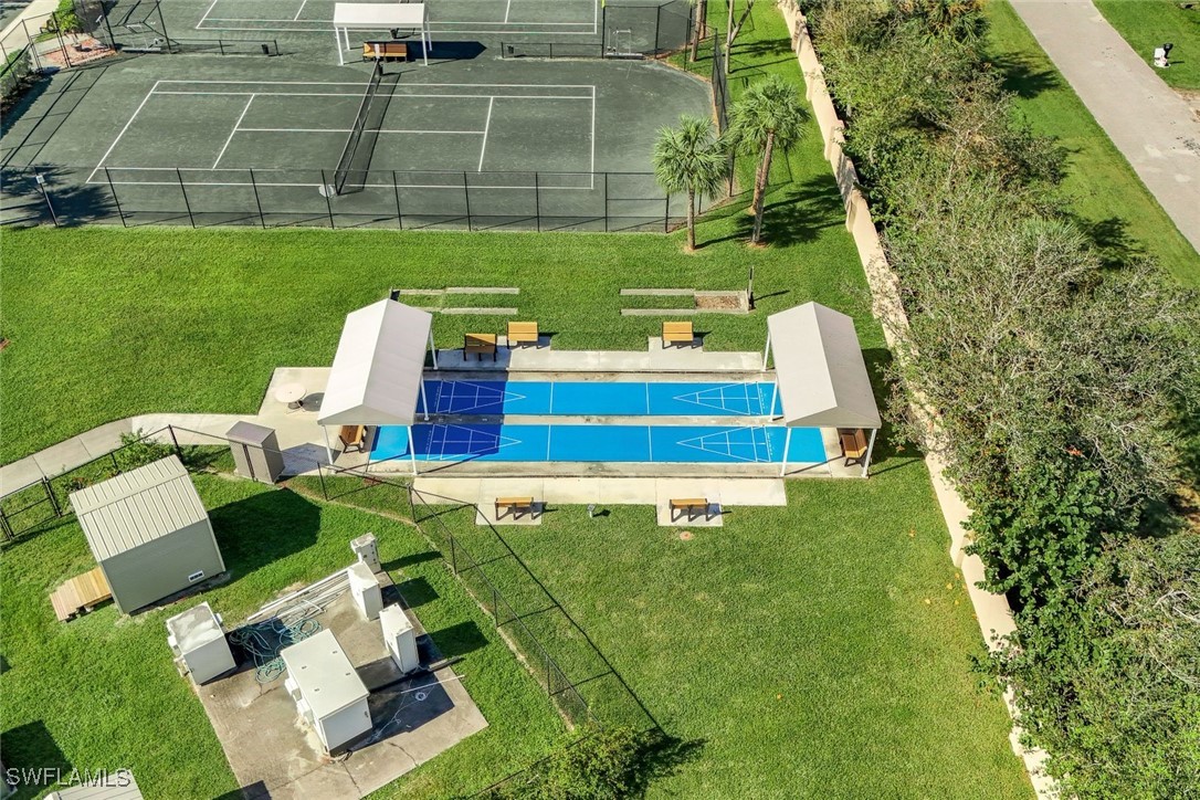 14061 Brant Point Circle, Unit 7304 Fort Myers, FL 33919 - Photo 44 of 49 a view of yard with seating area and trees