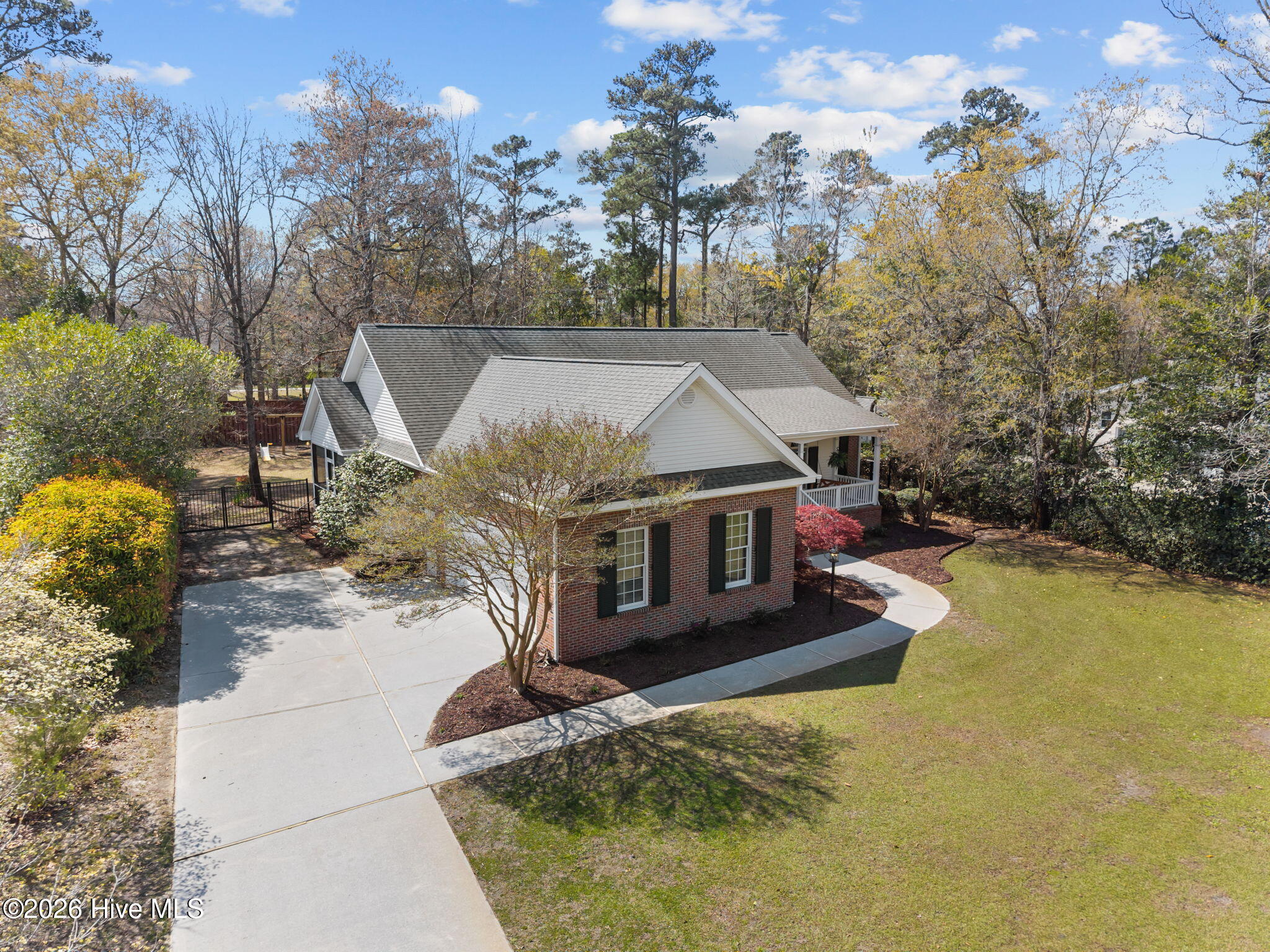 222 Hughes Road Hampstead, NC 28443 - Photo 1 of 55 57-web-or-mls-DJI_20260324123348_0871_D