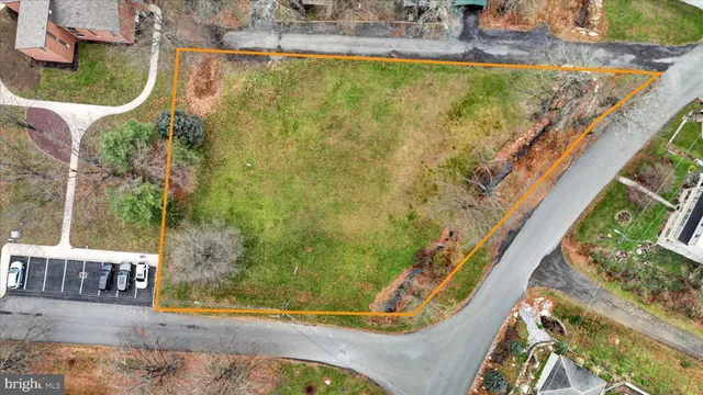 a view of swimming pool with seating area