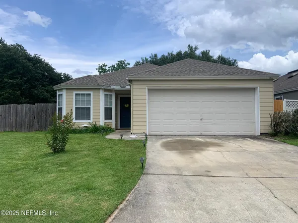 a front view of house with yard