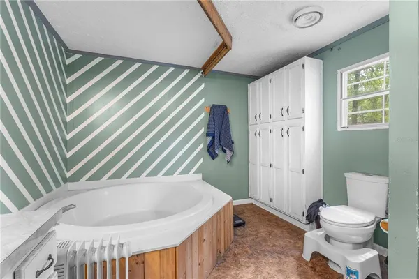 a bathroom with a sink and a toilet