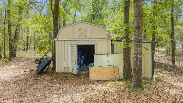 a house with trees in front of it