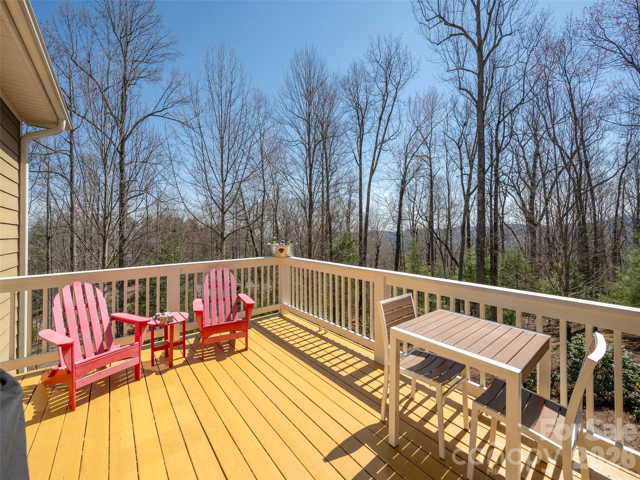 383 Monarch Road Hendersonville, NC 28739 - Photo 13 of 48 a view of balcony with wooden floor and outdoor seating