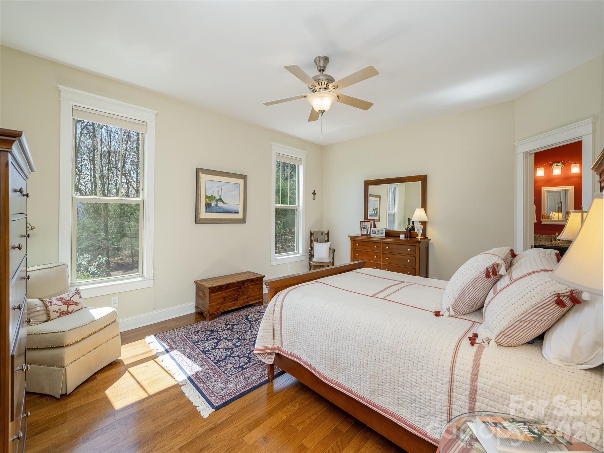 383 Monarch Road Hendersonville, NC 28739 - Photo 25 of 48 a bedroom with a bed and wooden floor