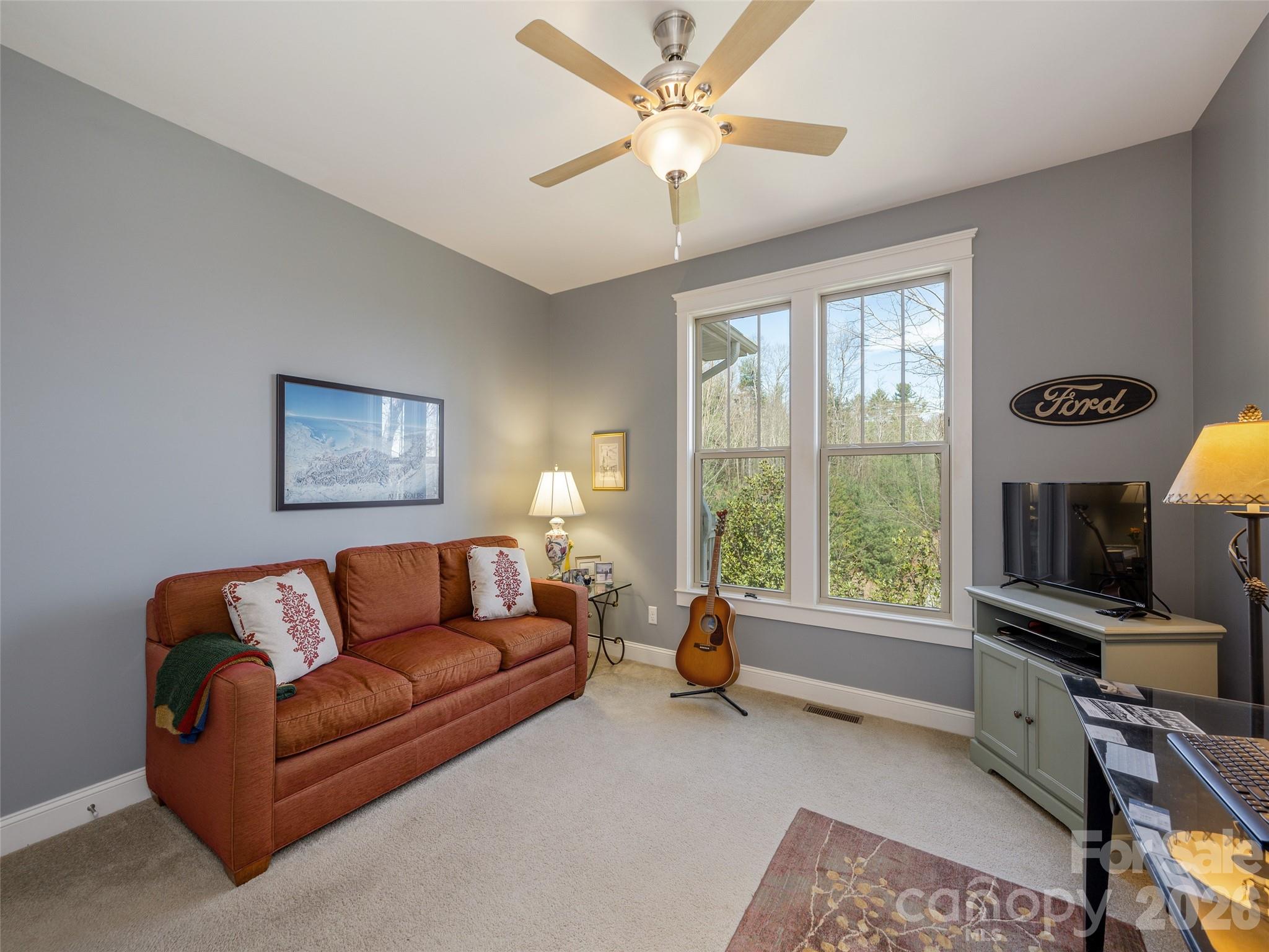 383 Monarch Road Hendersonville, NC 28739 - Photo 33 of 48 a living room with furniture and a window