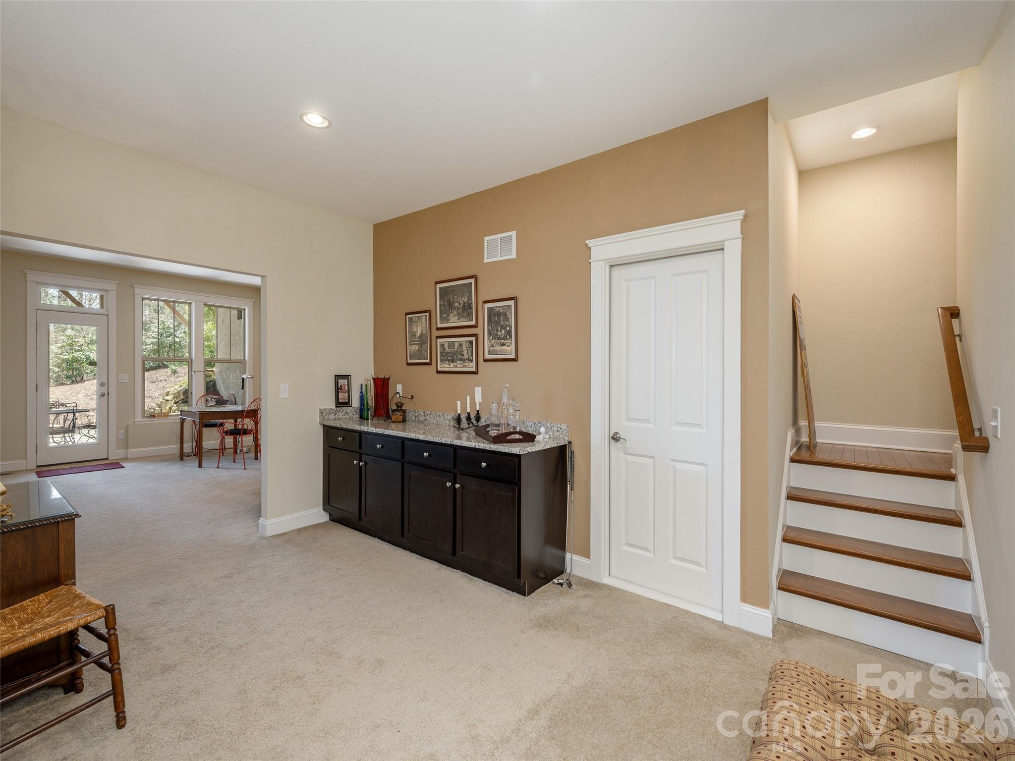 383 Monarch Road Hendersonville, NC 28739 - Photo 35 of 48 a bed room with a bed and furniture