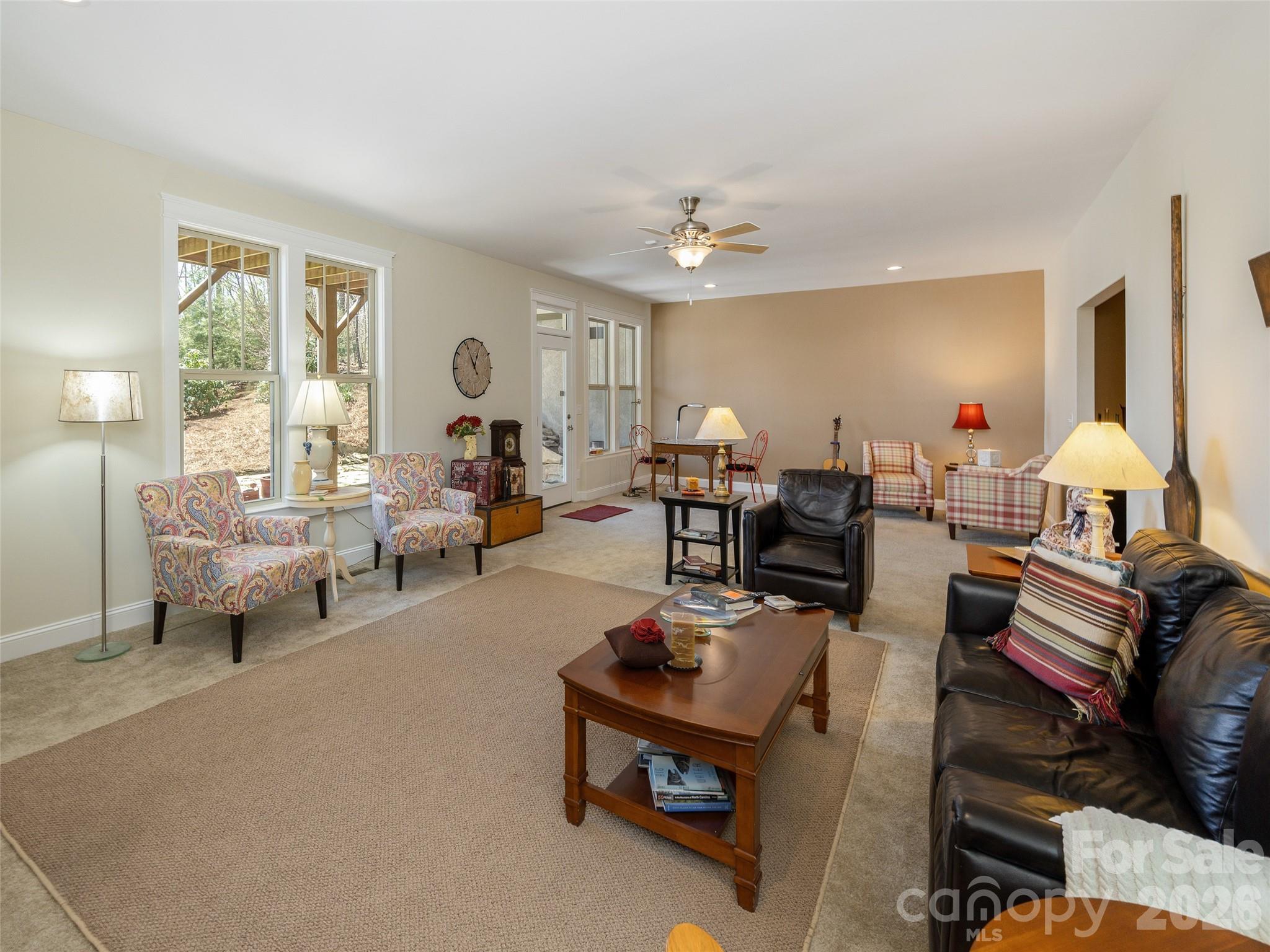 383 Monarch Road Hendersonville, NC 28739 - Photo 38 of 48 a living room with furniture and a large window
