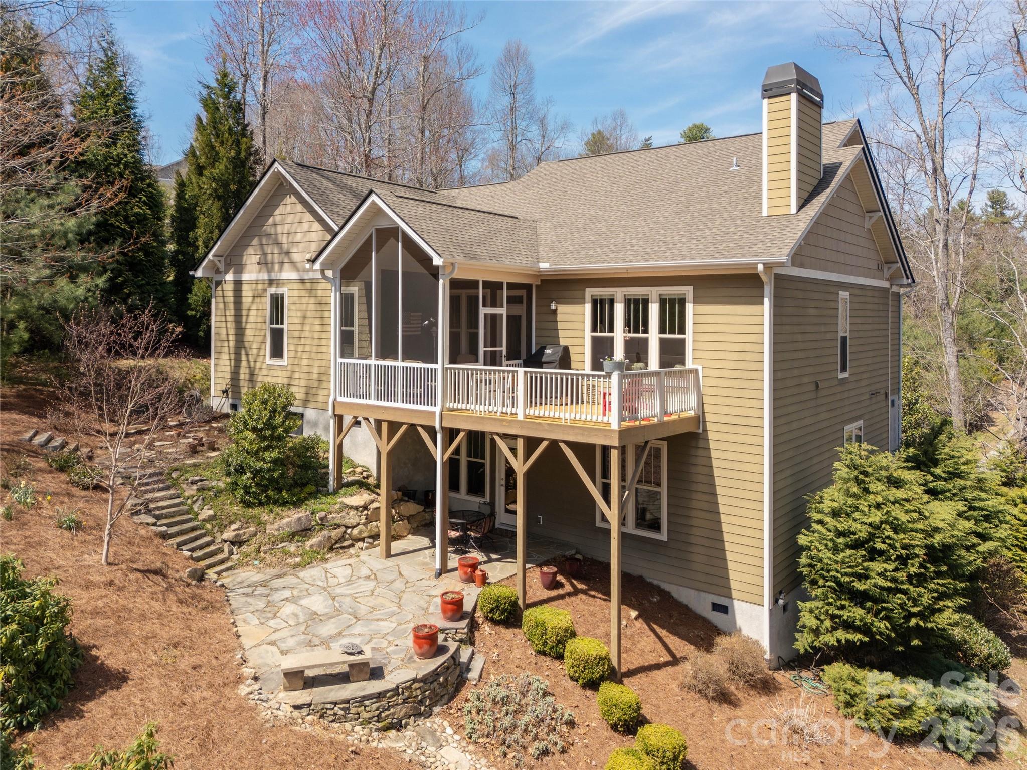383 Monarch Road Hendersonville, NC 28739 - Photo 45 of 48 a front view of a house with a yard and garage