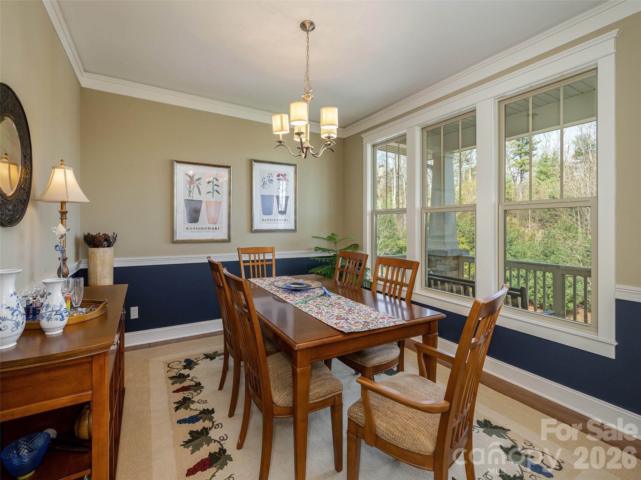 383 Monarch Road Hendersonville, NC 28739 - Photo 6 of 48 a view of a dining room with furniture window and outside view