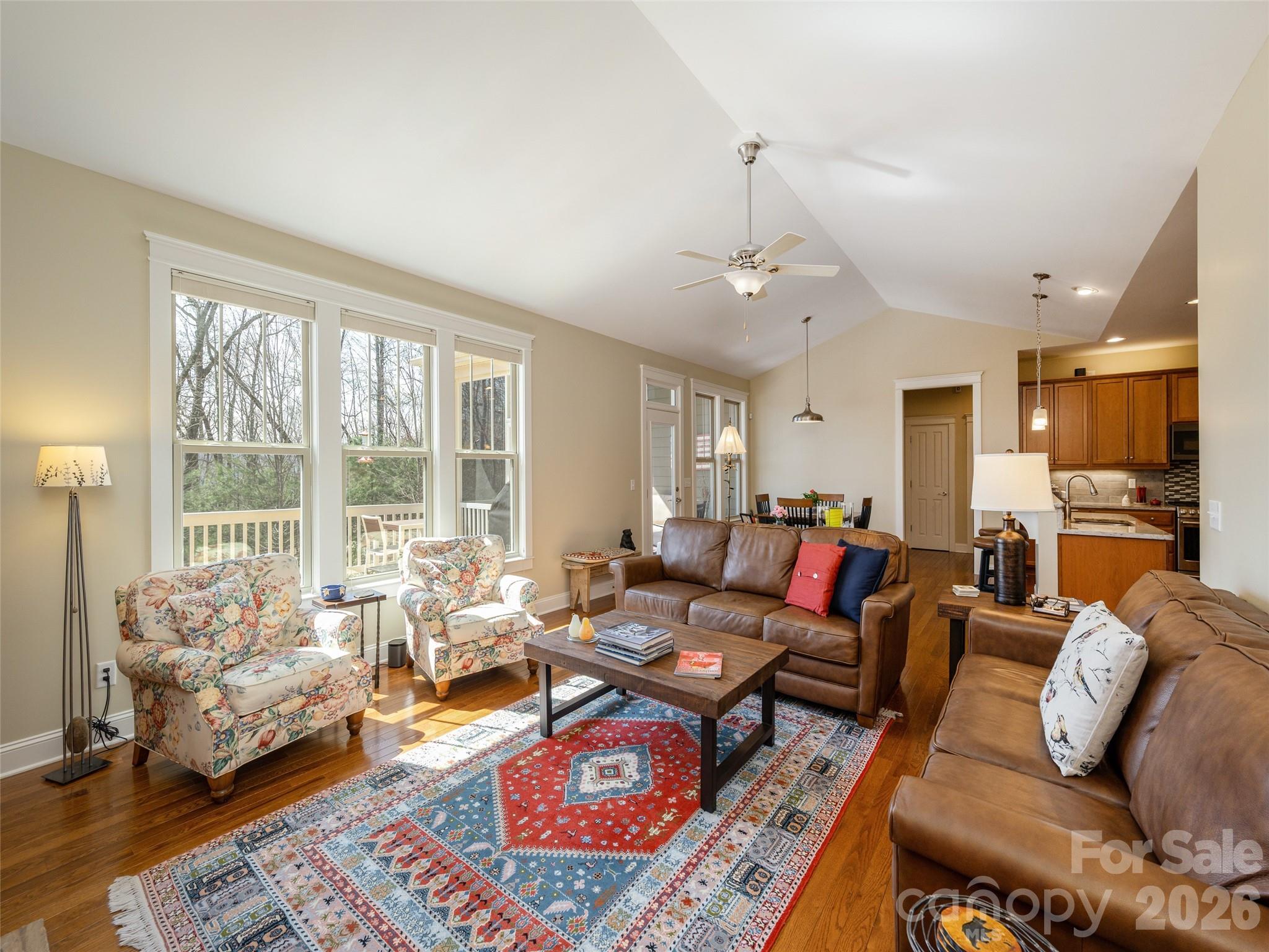383 Monarch Road Hendersonville, NC 28739 - Photo 9 of 48 a living room with furniture fireplace and a large window