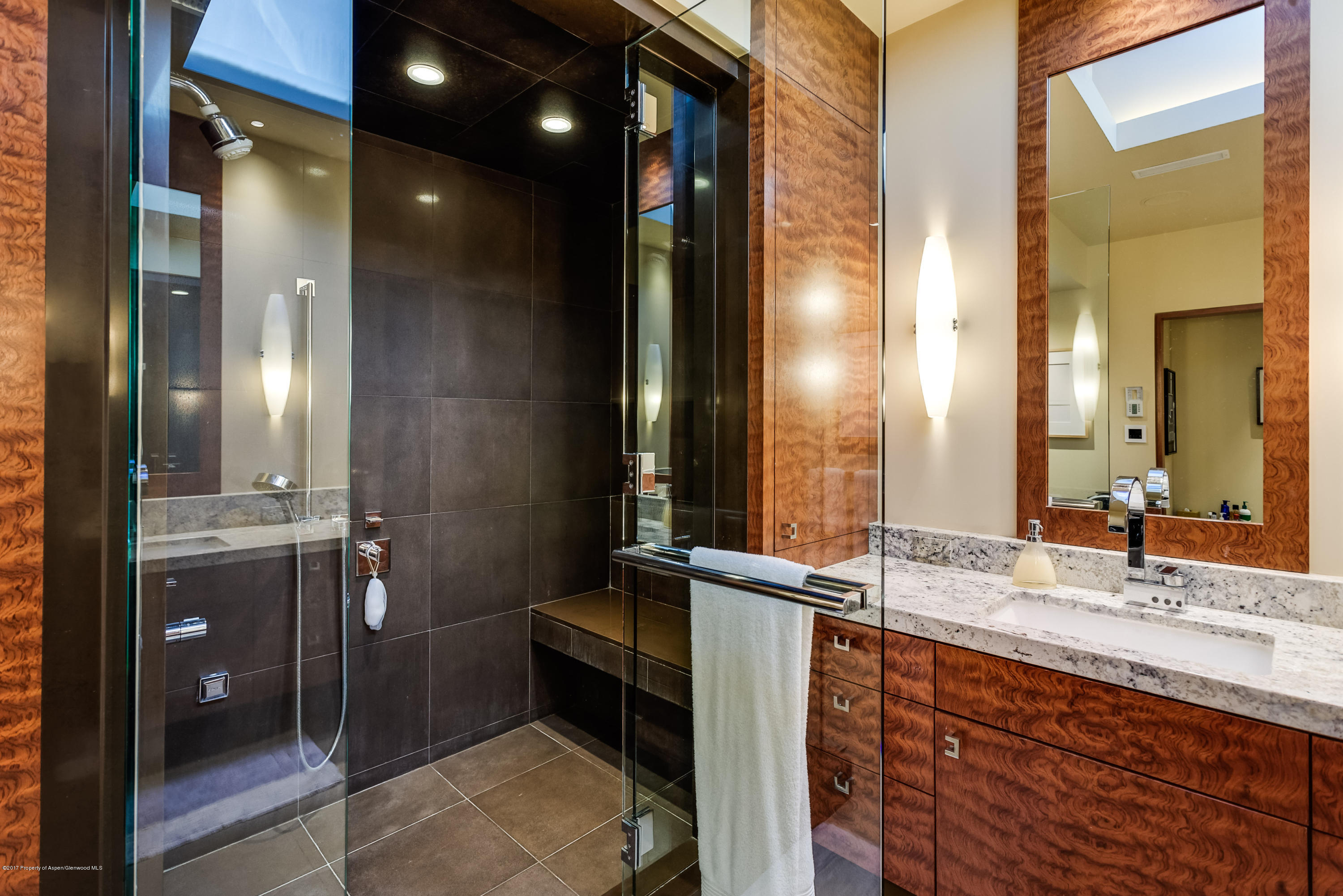 710 East Durant Avenue, Unit C & D Aspen, CO 81611 - Photo 13 of 23 a bathroom with double vanity and a mirror
