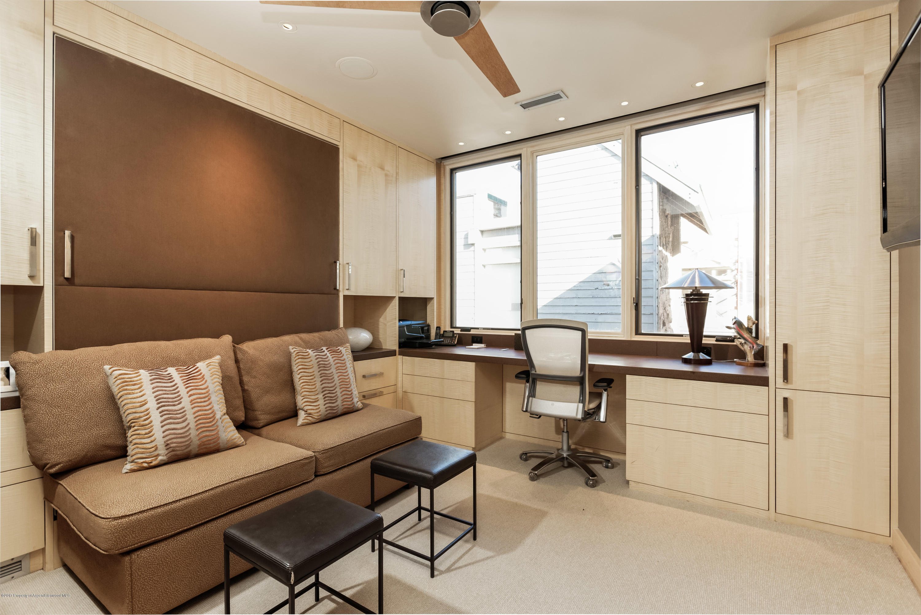 710 East Durant Avenue, Unit C & D Aspen, CO 81611 - Photo 15 of 23 a living room with furniture and a large window